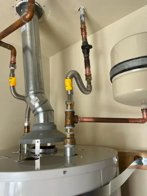 Water heater installation and plumbing repair in Spring Brook Plant